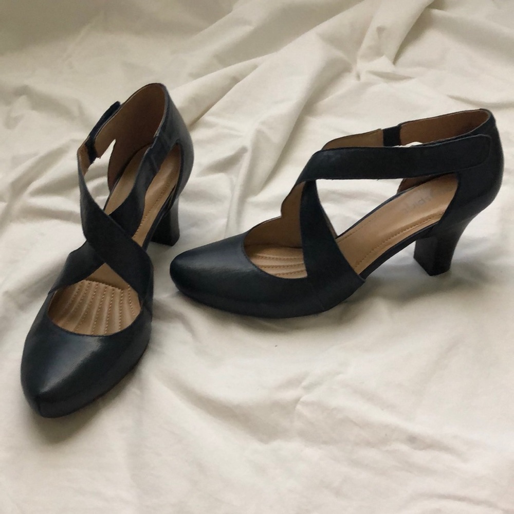 Beautiful, dark blue, 2 inch heels with a Velcro strap. size 8 narrow.